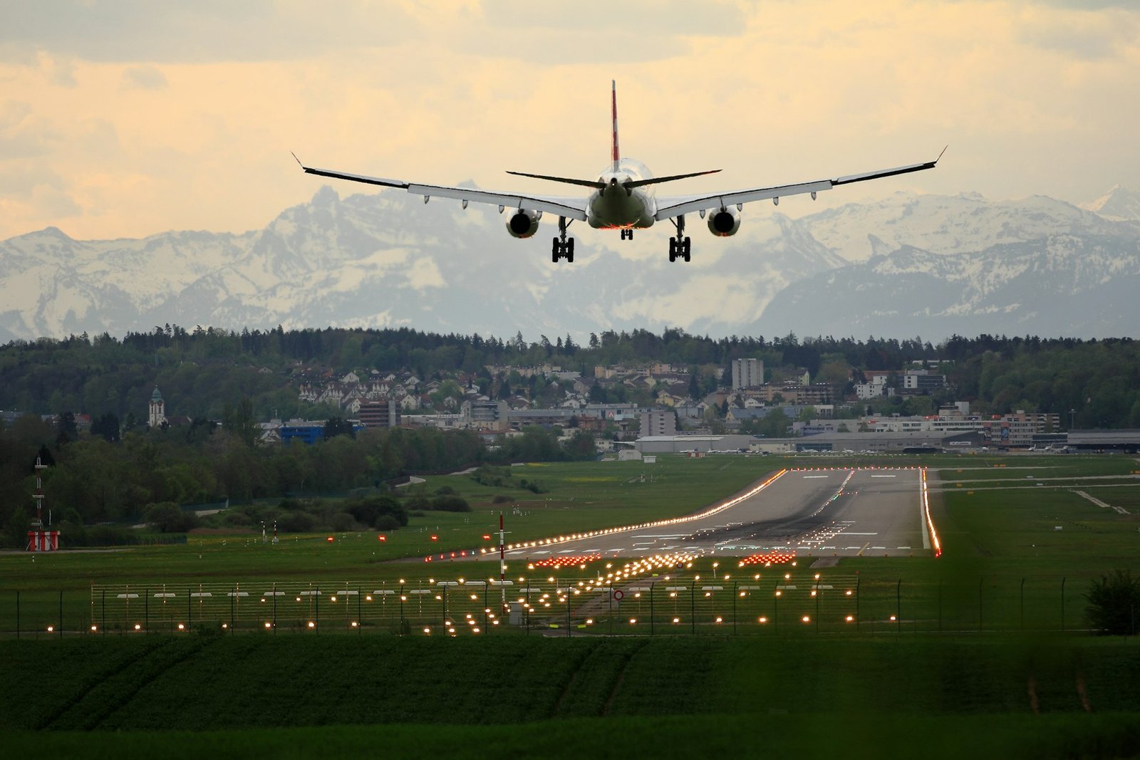 Commercial aircraft on the airport apron at dusk